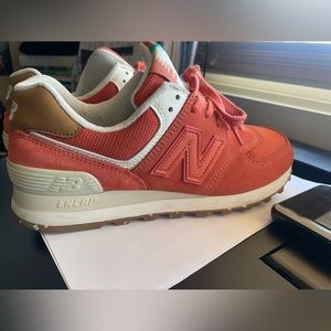 Women Orange New Balance 574 size 7